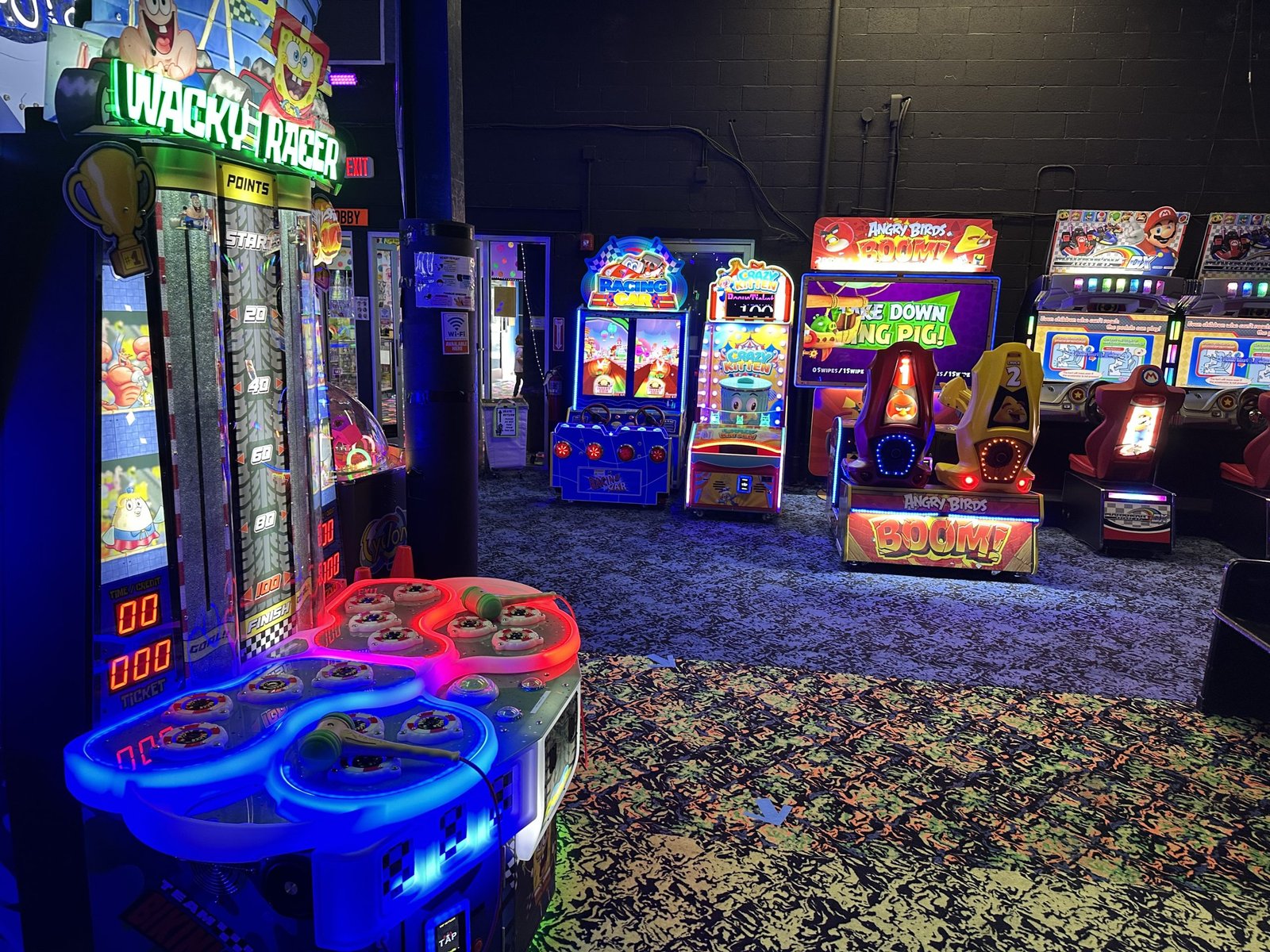 Families enjoying multiple indoor activities together in Pittsburgh