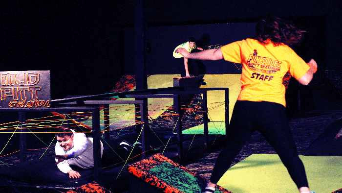 Kids completing an indoor ninja obstacle course in Pittsburgh