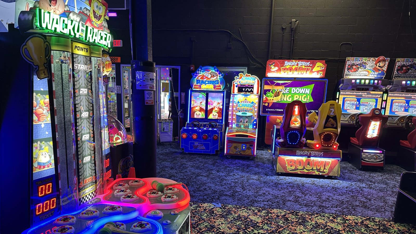 Families enjoying multiple indoor activities together in Pittsburgh