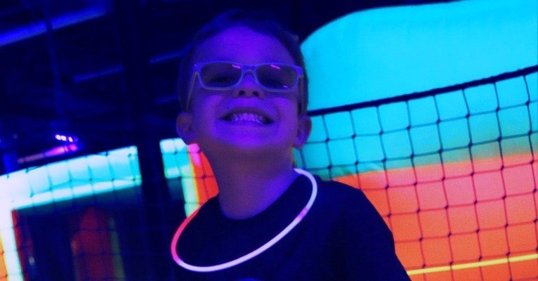 Happy kids finishing an indoor play session on a rainy or snowy day