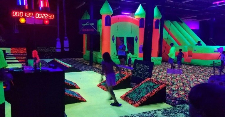Kids running, playing, and laughing during active indoor play
