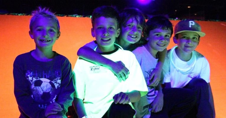 Happy kids finishing a birthday party celebration