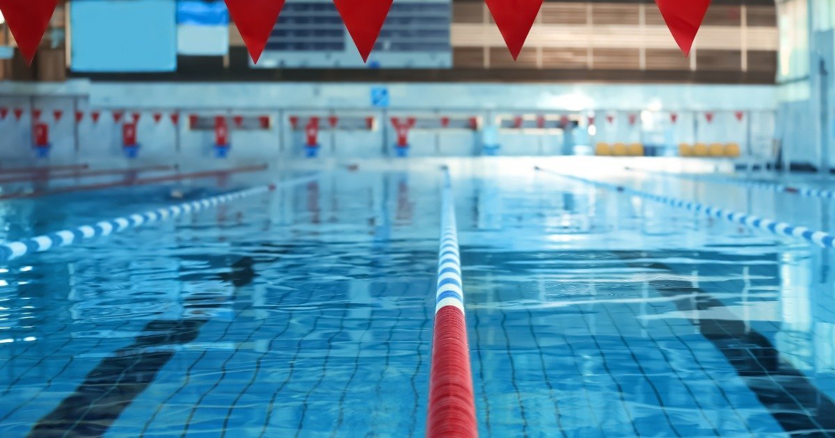 Kids playing in an indoor pool during winter