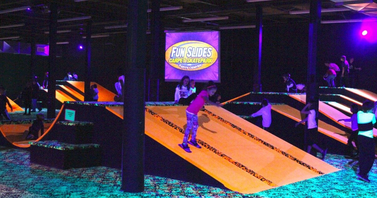 Kids sliding and playing during a Fun Slides birthday party