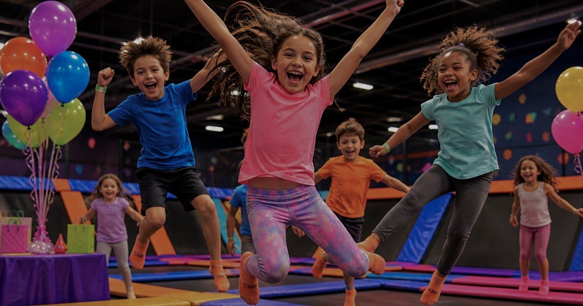 Kids jumping at an indoor trampoline park birthday party for ages 6 and up