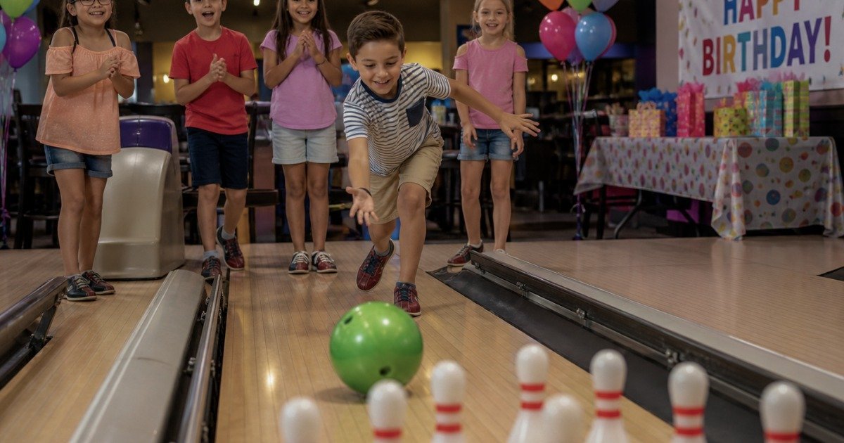 Kids birthday party at a bowling alley with bumper lanes and bright overhead lighting