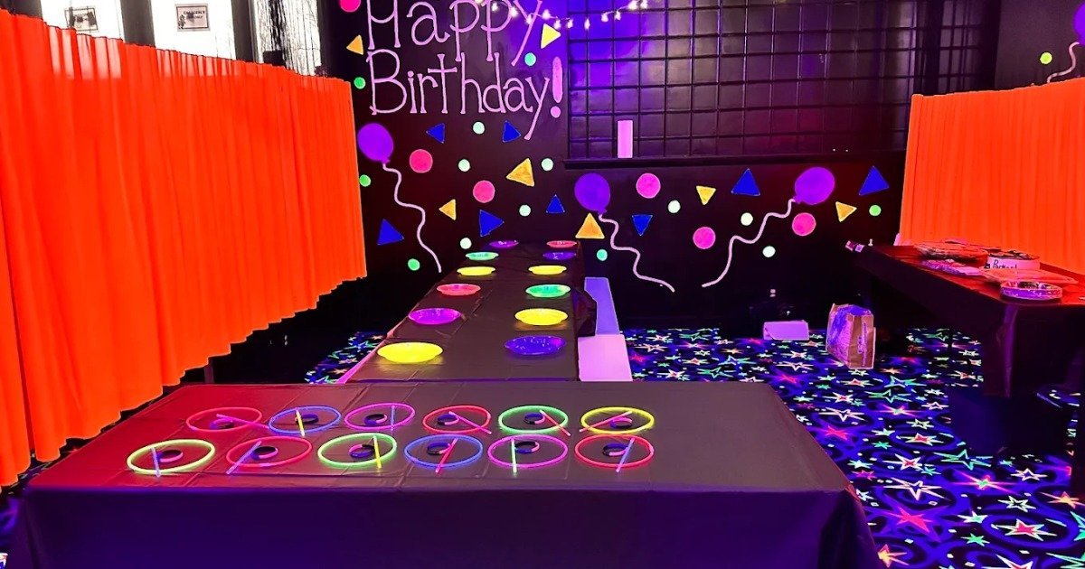 Birthday party food setup with pizza and cake at an indoor kids party venue