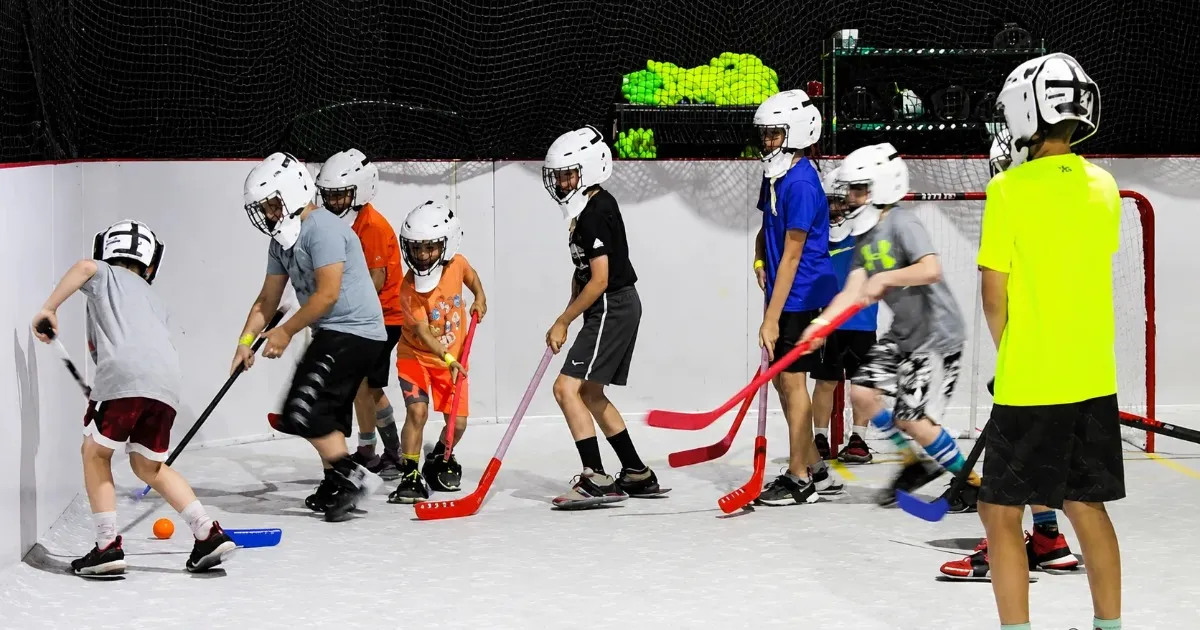 Kids enjoying indoor activities in Pittsburgh on a cold winter day — carpet skating, museums, and more