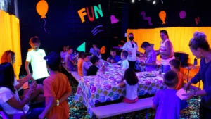Kids enjoying indoor birthday party activities at Fun Slides Carpet Skatepark in Pittsburg
