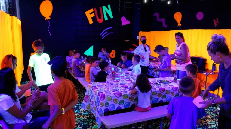 Kids enjoying indoor birthday party activities at Fun Slides Carpet Skatepark in Pittsburg
